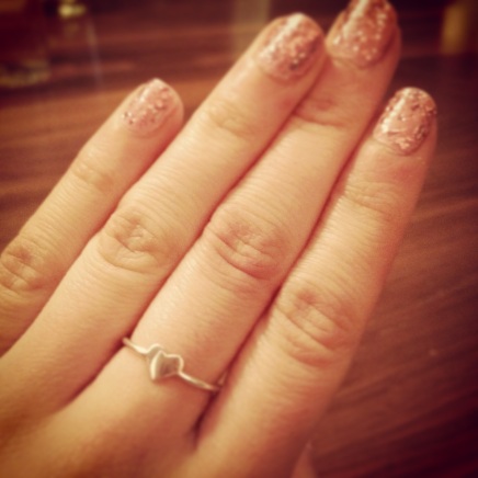 A pink sparkly manicure and my new heart ring gifted from my sister